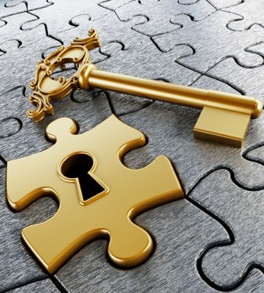 Jigsawa puzzle with golden key